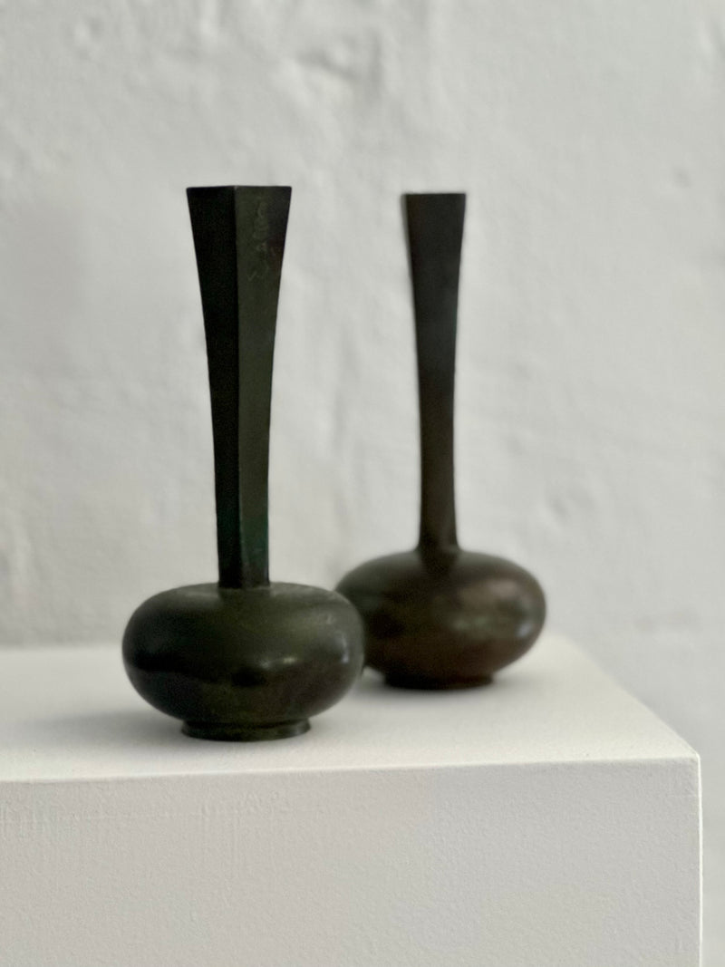 Pair of patinated bronze vases