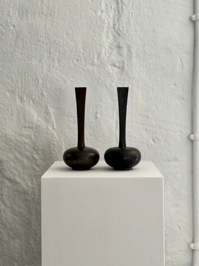 Pair of patinated bronze vases
