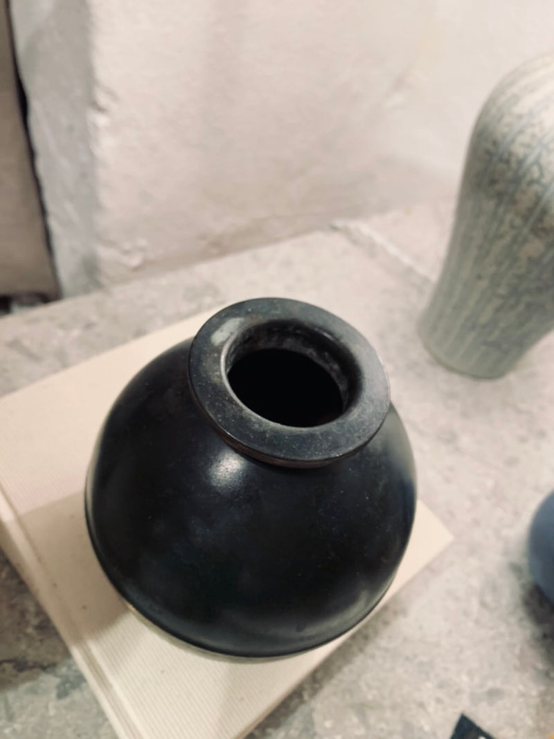 Saturn bronze vase